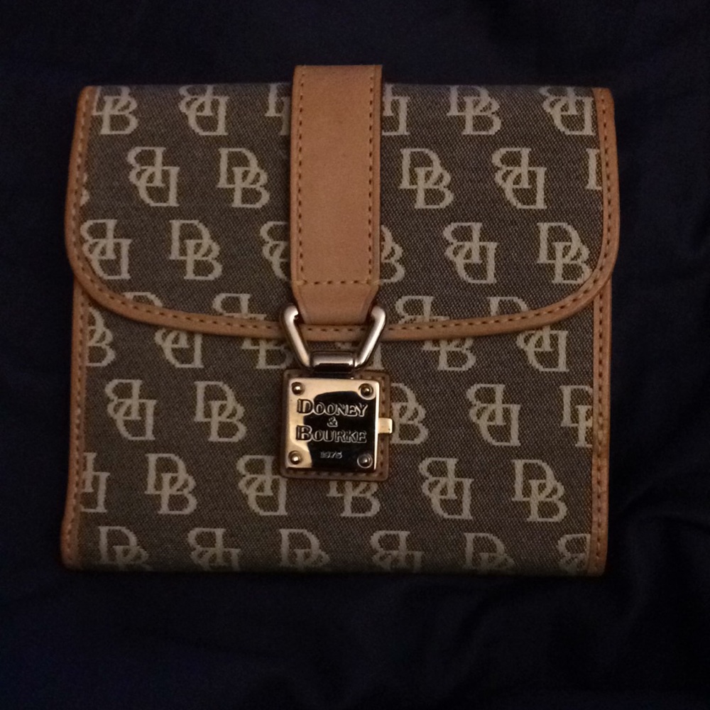 Dooney and Bourke beige wallet.